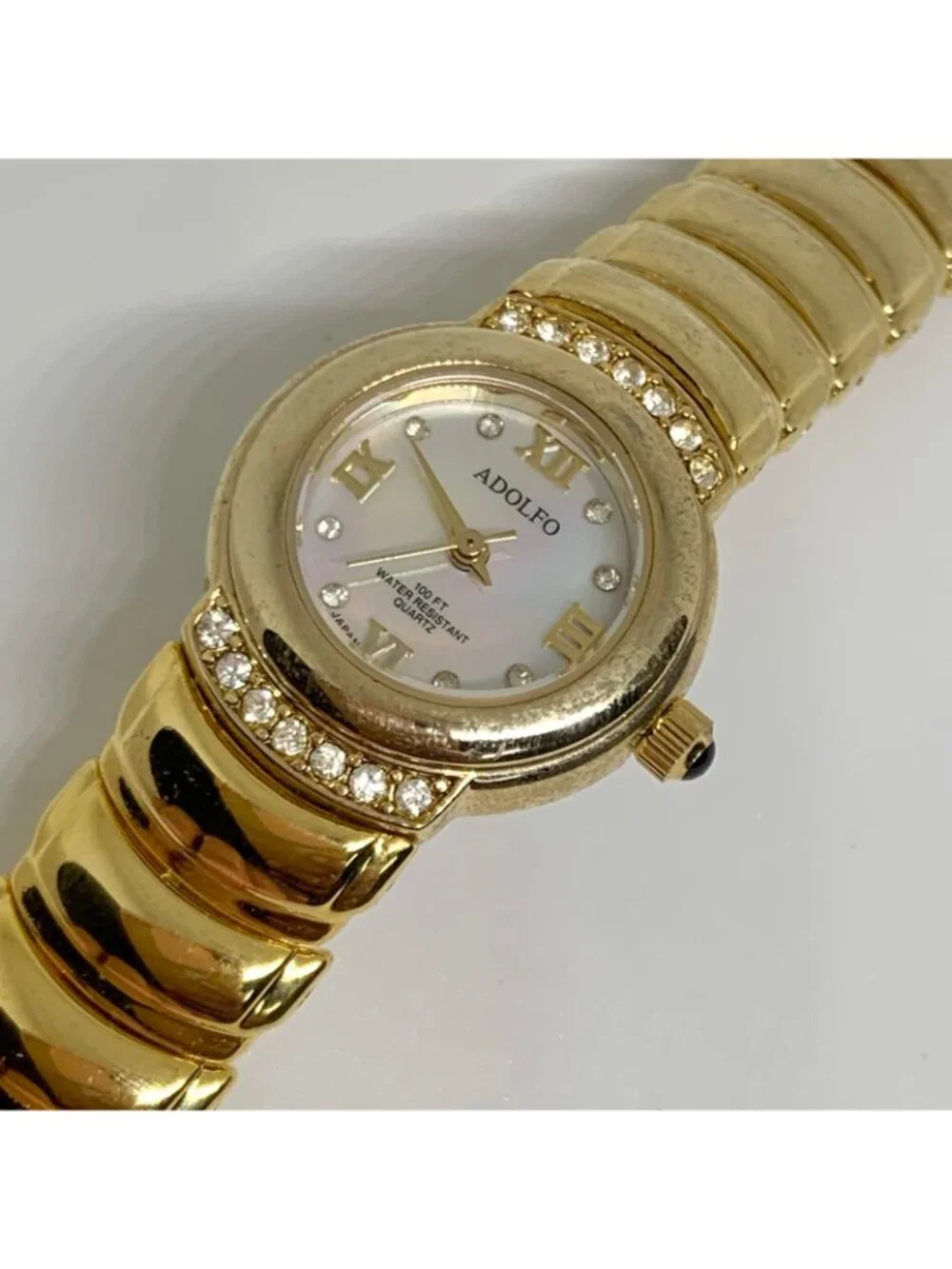 Adolfo women’s gold tone watch quartz mop dial rhinestones 22mm 6.5” running